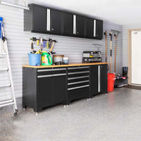 NewAge Pro Series Cabinet Set 8 Pieces 84 In Worktop With Silver Accents Mounted On The Wall And Below A Wooden Countertop