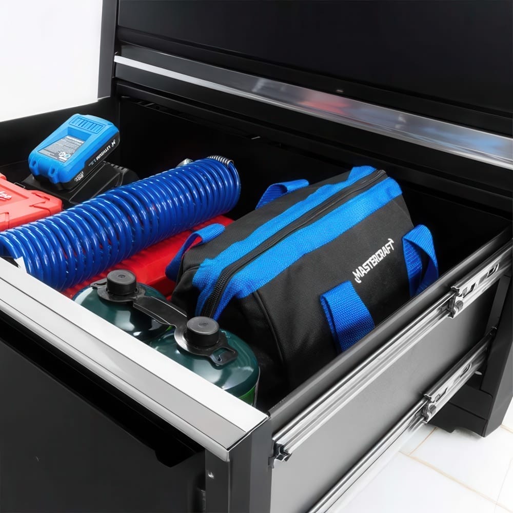 Open Deep Tool Drawer Storing Blue Coiled Hose Propane Canisters Battery Charger Red Case And Mastercraft Tool Bag