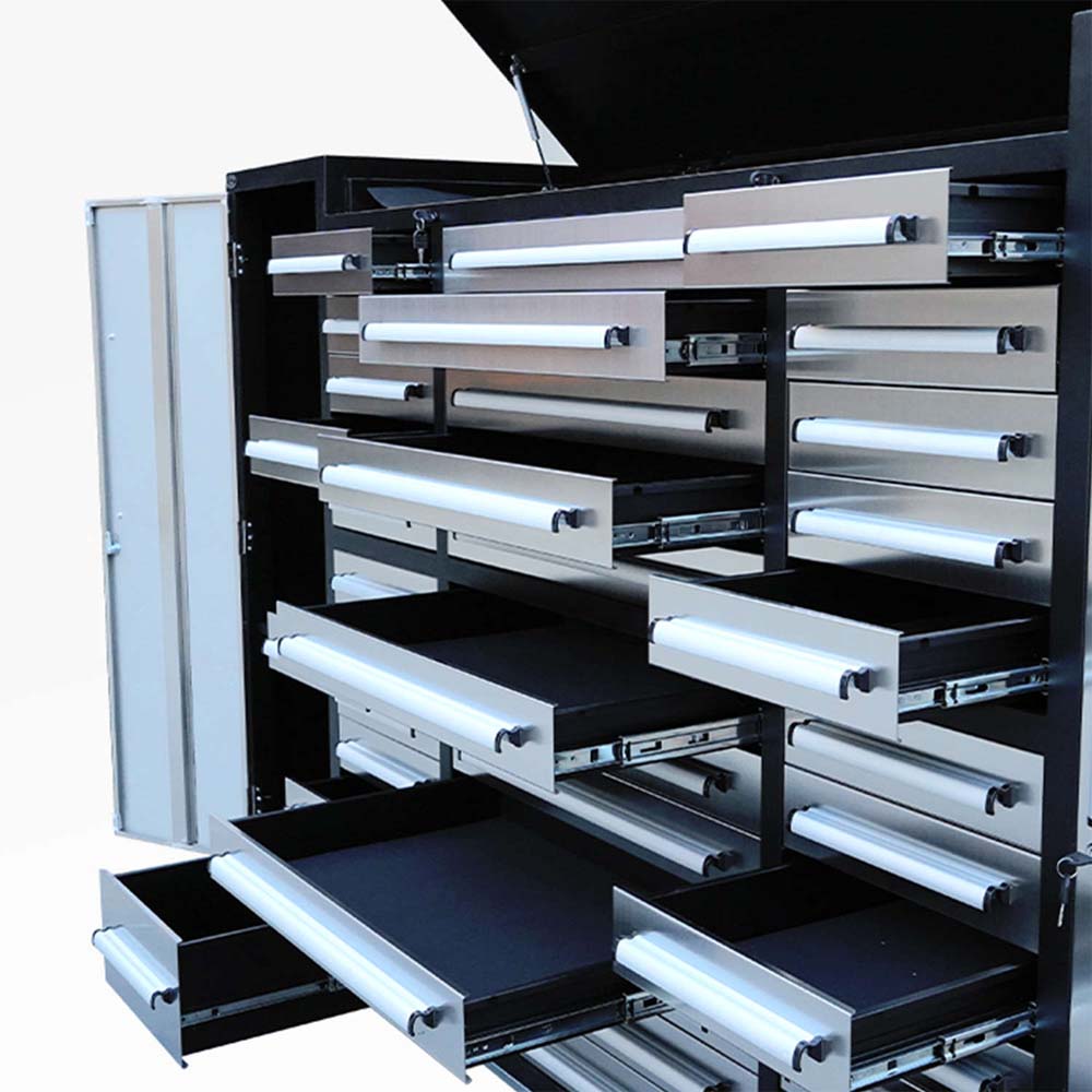 Open Tool Storage Cabinet With Multiple Silver Drawers Pulled Out