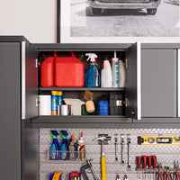 Open Upper Garage Cabinet Stuffed With Fuel Cans And Cleaners Sits Above A Diamond Plate Tool Wall With Sprays Hammer And Screwdrivers
