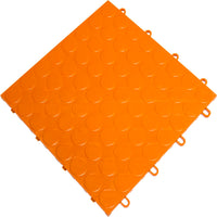 Orange RaceDeck Garage Flooring Circle Trac With A Raised Circular Pattern