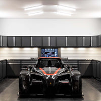 Organized Garage Featuring Pro 3.0 9 Piece Garage Cabinet Set With Utility Cart, Bright Fluorescent Lighting, And A High Tech Digital Display Panel