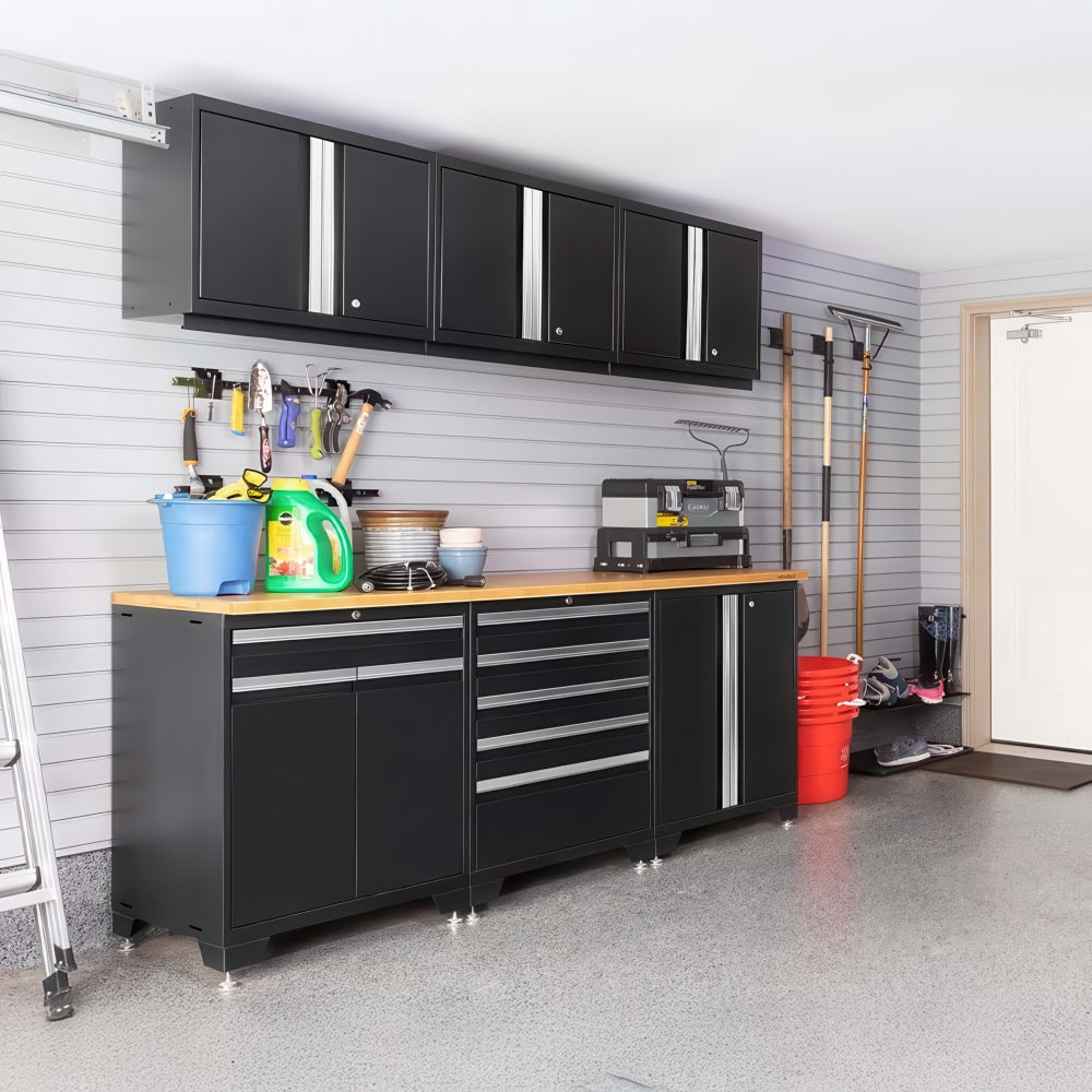 Organized Garage With Black Cabinets Wood Worktop Wall Hung Tools And Corner Storage By The Door