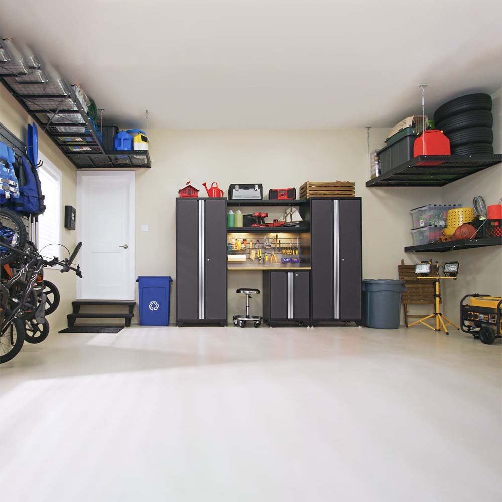 Organized Garage With NewAge Bold Series 10 Piece Cabinet Set, Overhead Storage Racks, Various Sports Equipment, Tools, And Household Items