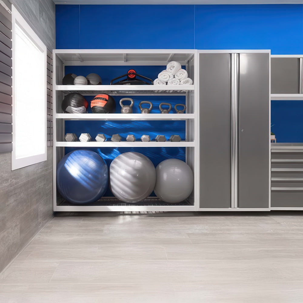 Organized Gym Shelving Holds Exercise Balls Kettlebells Dumbbells And Towels Beside A Tall Gray Storage Cabinet Against A Bright Blue Wall