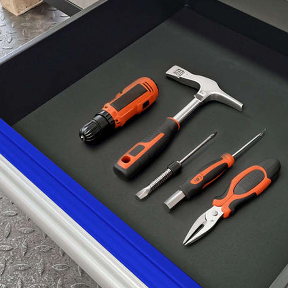 Organized Tool Drawer With Foam Liner Holding A Cordless Screwdriver Hammer Two Screwdrivers And Pliers