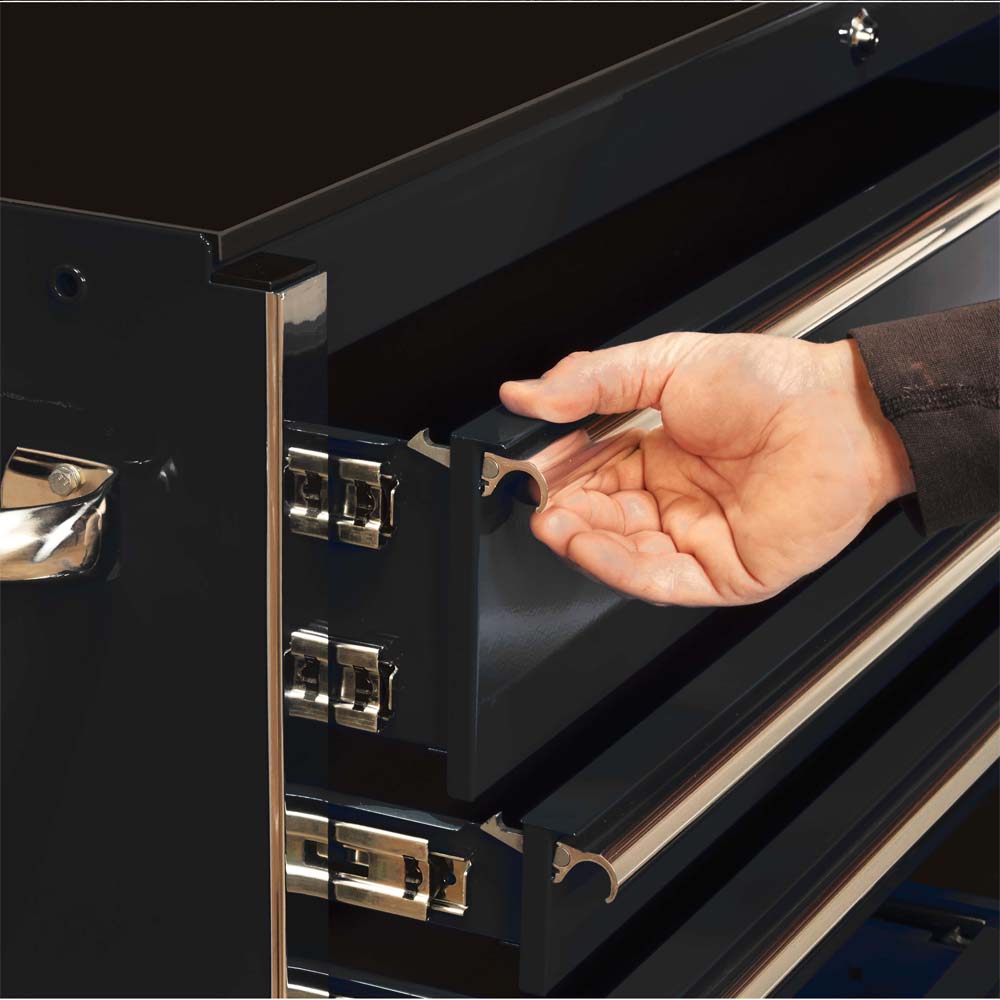 Person’s Hand Opening A Drawer Of A Black Metal Extreme Tools Tool Top Chest With A Quick Release Latch Mechanism