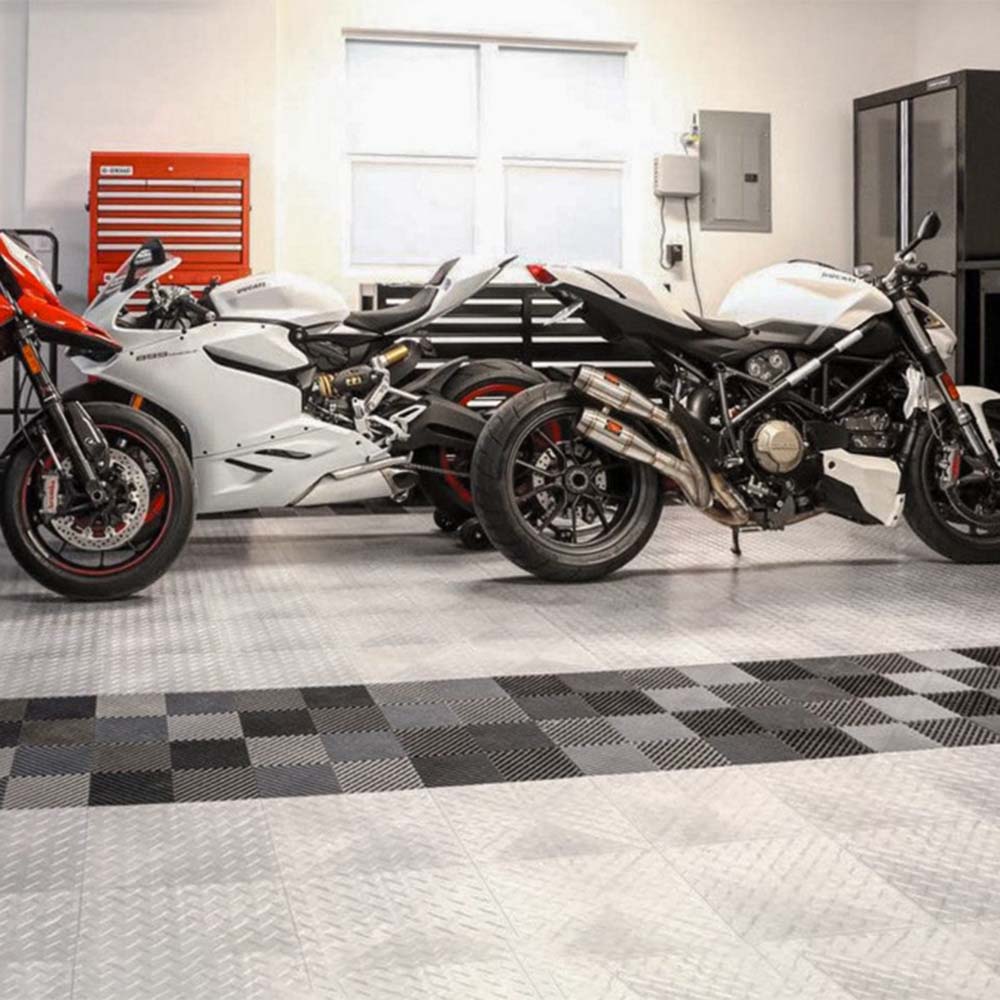 Pristine Garage With A Checkered Race Deck Freeflow Flooring Housing Two High Performance Motorcycles