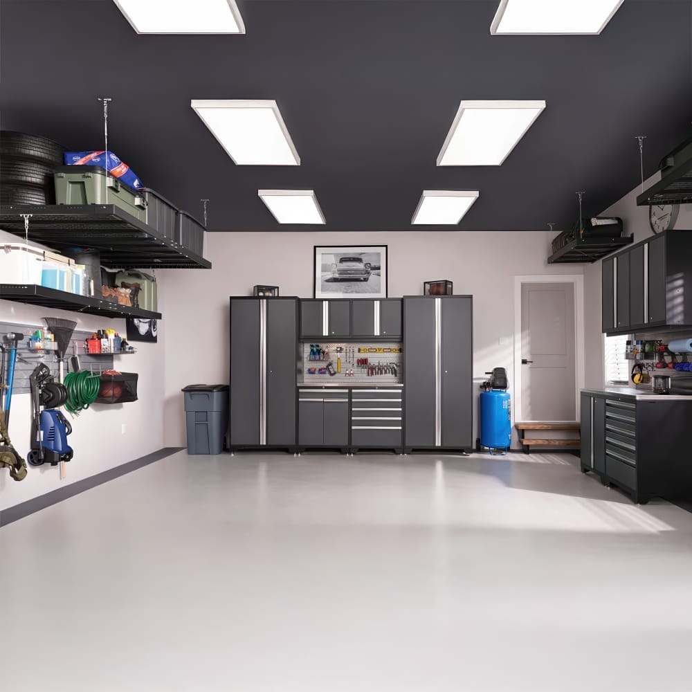 Pristine Garage With Overhead Racks Wall Mounted Cabinets Central Tool Station And Polished Floor Under Bright Panel Lights