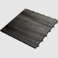 Racedeck Charred Oak Tile With A Matte Finish Featuring Small Connectors Along The Edges
