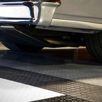 Rear Bumper And Exhaust System Of A Vehicle Featuring A Racedeck Diamond Tiles