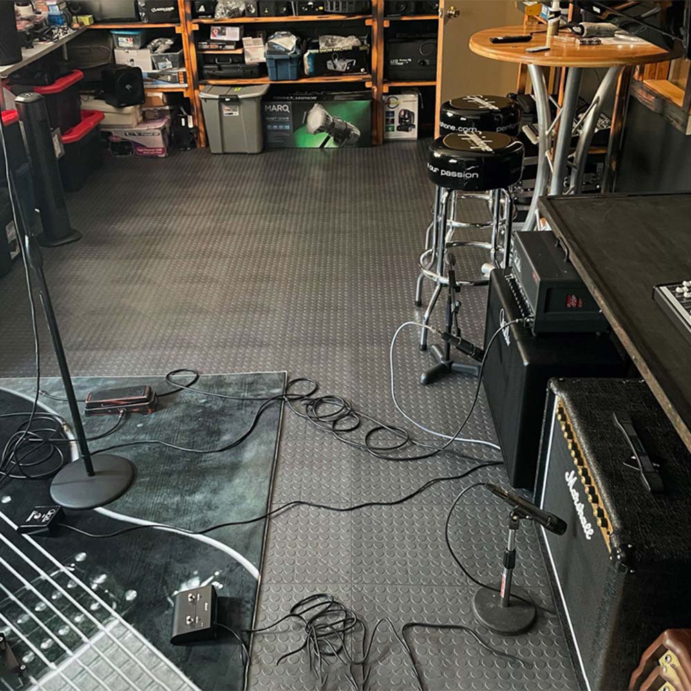 Recording Studio With Race Deck Tiles Circle Trac Featuring Various Musical Equipment