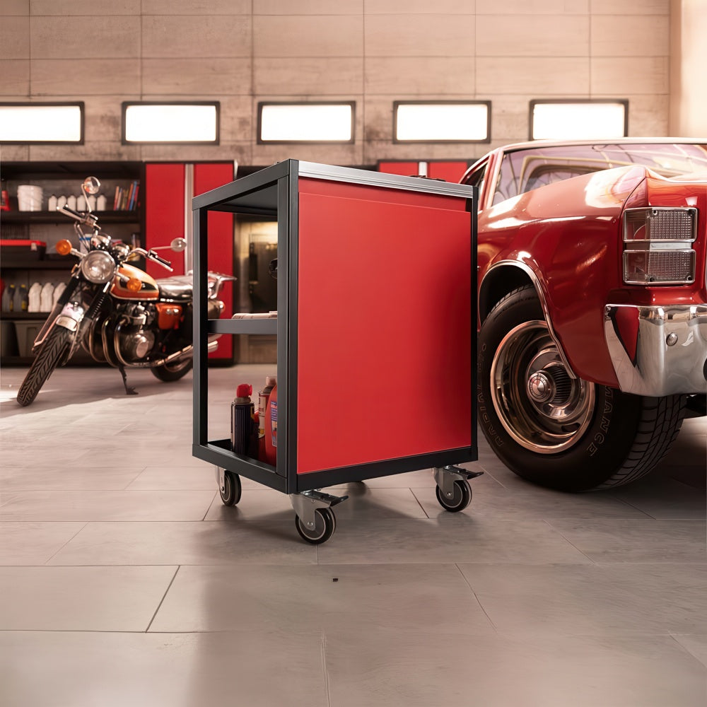 Red Mobile Garage Cart On Casters Parked Between A Classic Car And Motorcycle In A Well Lit Workshop