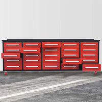 Rolling Tool Cabinet Workbench With Many Drawers Partly Pulled Out On Casters