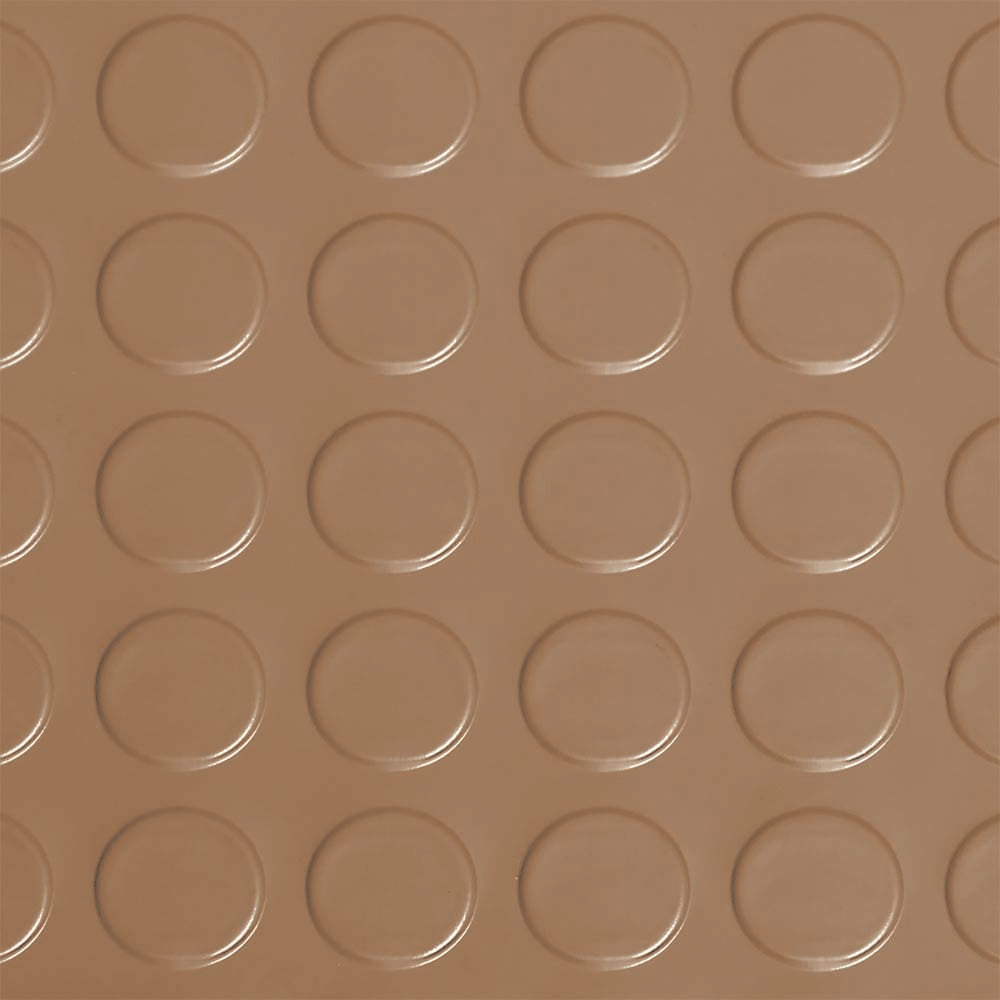 Sandstone Coin Roll Flooring With A Repeating Pattern Of Raised Circular Bumps Arranged In A Grid