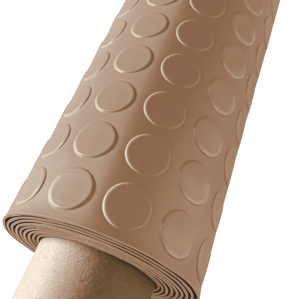 Sandstone Coin Roll Out Flooring Partially Unrolled Sheet Featuring An Embossed Pattern Of Uniform Circular Protrusions