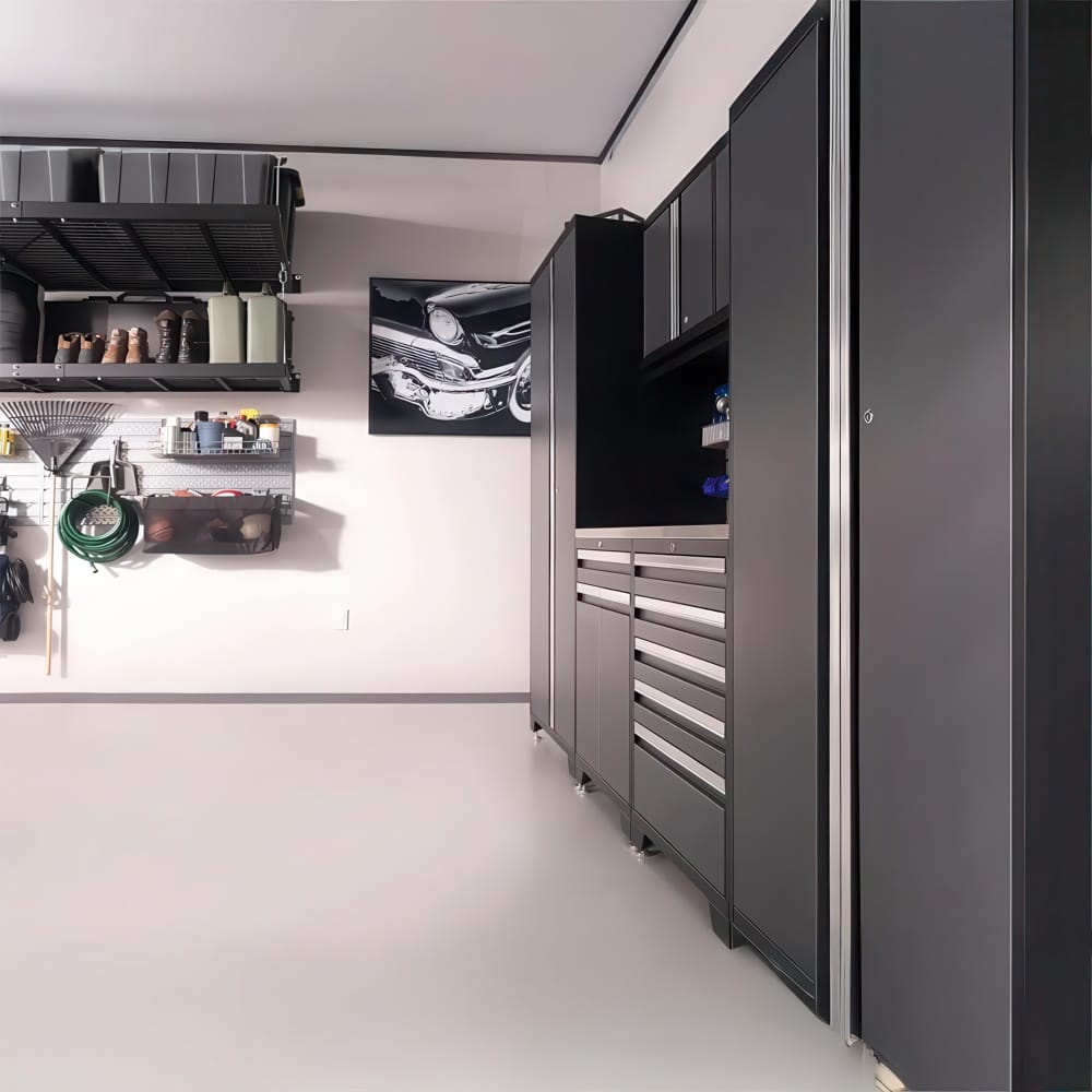 Side View Of Organized Garage With Tall Cabinets And Wall Mounted Storage Racks