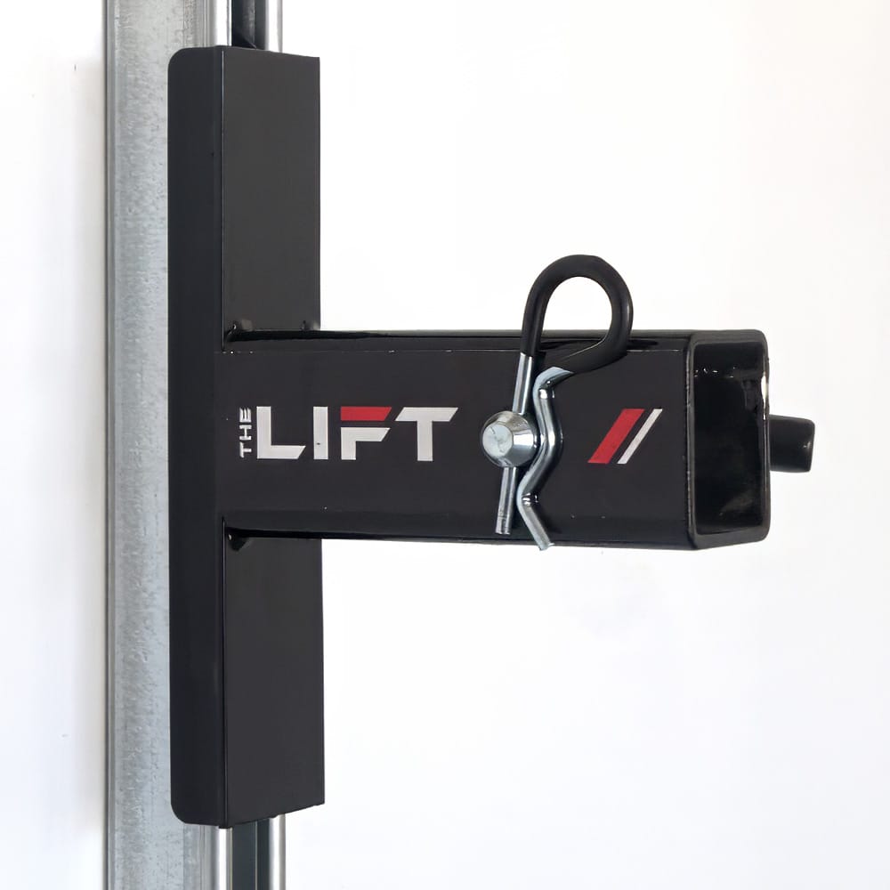 Sleek Black Mechanical Lifting Device Labeled The Lift Equipped With A Locking Pin And Attached To A Vertical Metal Column