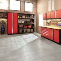 Spacious Garage Workshop With Red Cabinets Open Shelving And A Well Lit Wood Top Workbench Along One Wall