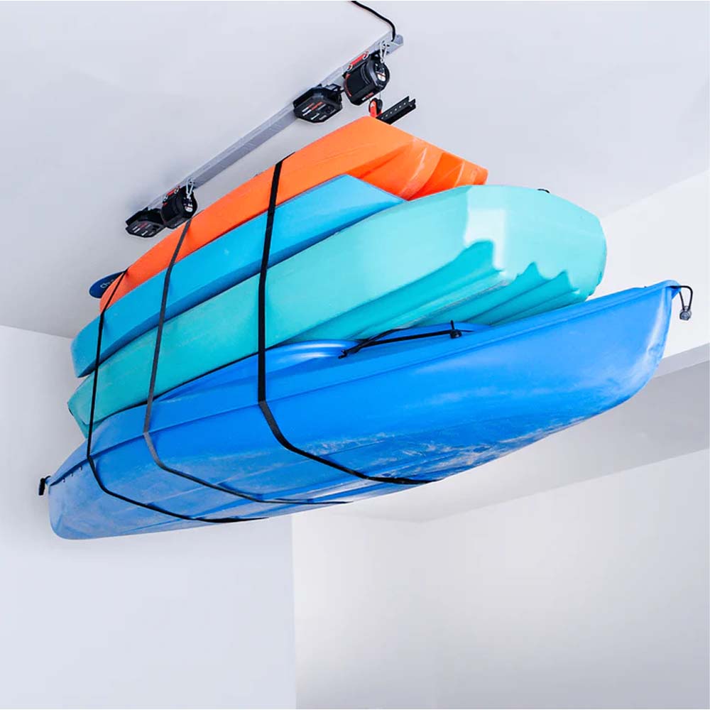 Stacked Kayaks Are Secured And Suspended From A Garage Ceiling By Smarter Home Electric Lift For Garage Attic For Efficient Space Utilization