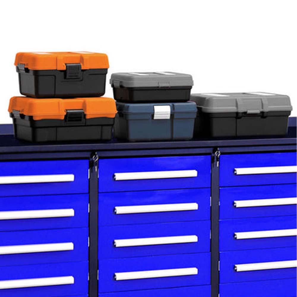 Stacked Plastic Tool Boxes Sit On Top Of A Blue Multi Drawer Tool Cabinet