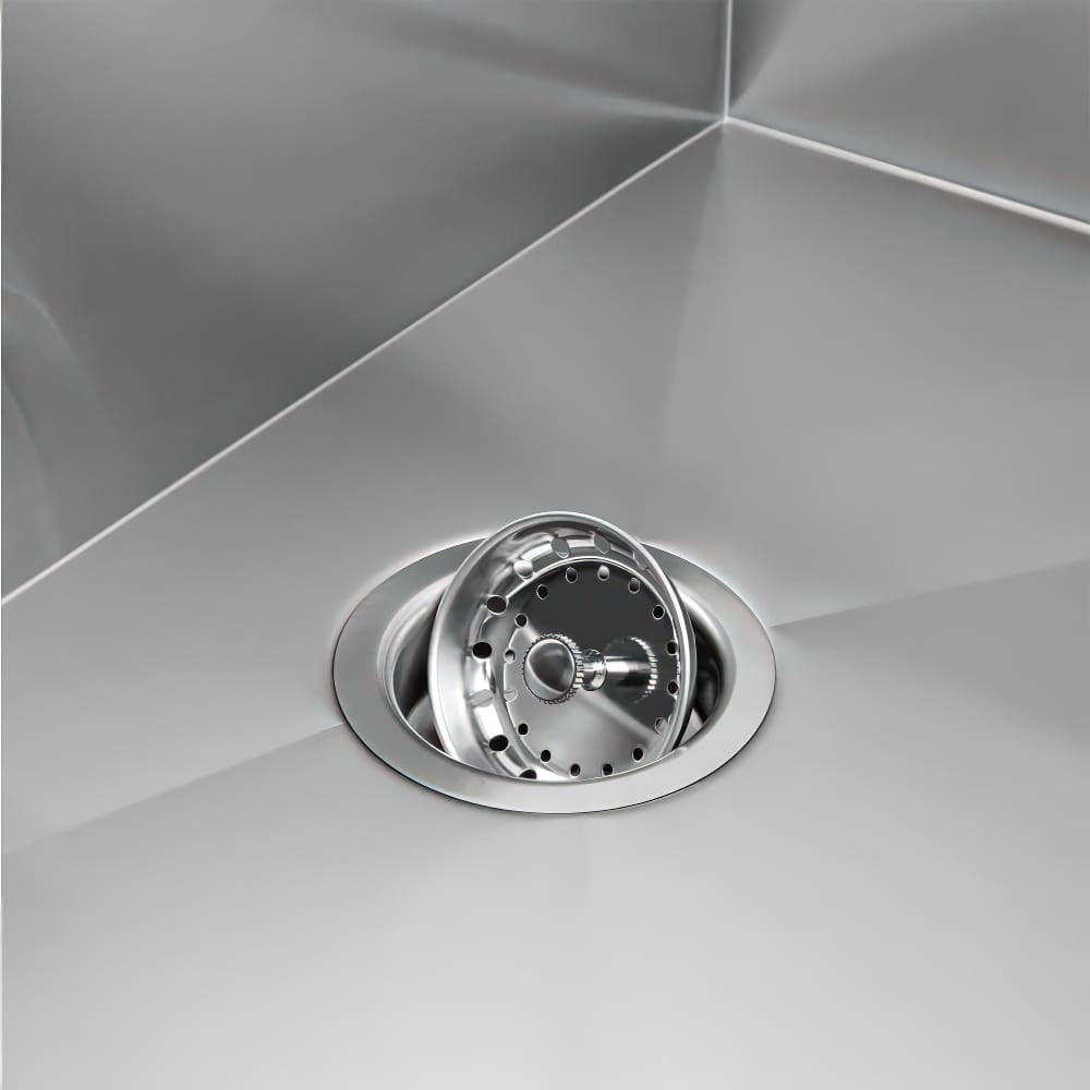 Stainless Steel Sink With A Modern Strainer Basket In The Drain Hole
