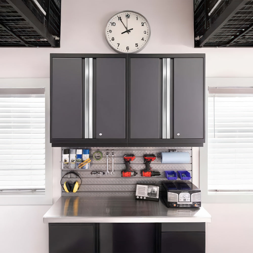 Stainless Steel Workbench Is Neatly Organized With Wall-Mounted Cabinets Tools And Supplies