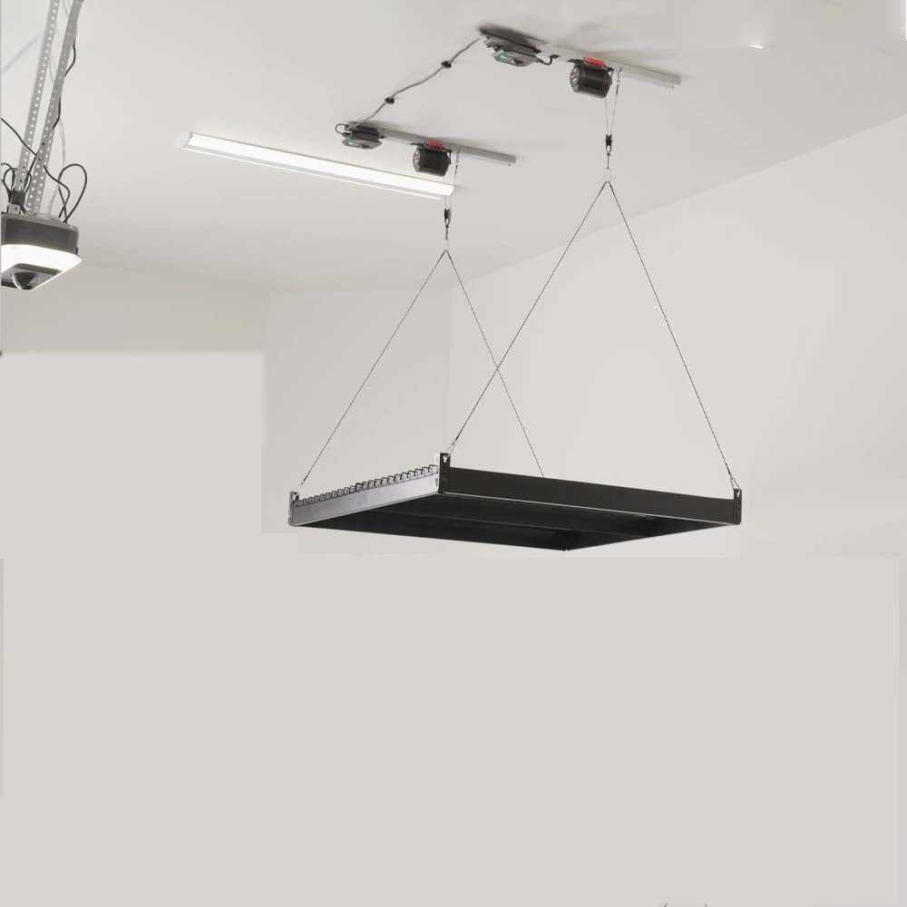 Suspended Black Storage Shelf Dangling By Cables From Two Motorized Units Of Platform Storage Lift By SmarterHome On A Garage Ceiling