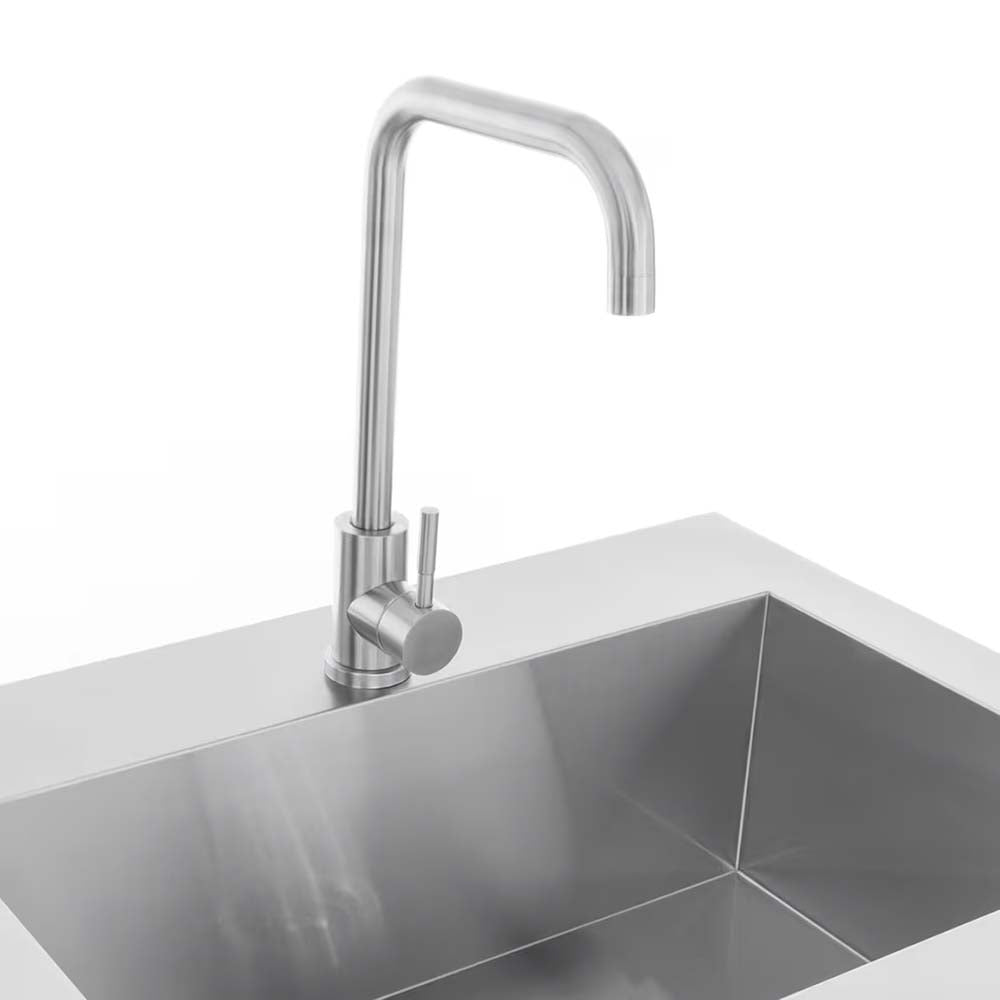 Tall Rounded Stainless Steel Faucet Set Above A Deep Rectangular Metal Sink