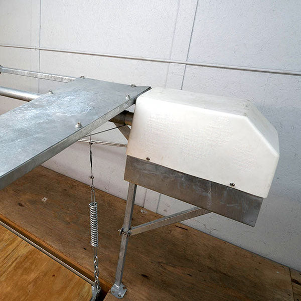 Weather-Resistant Attic Lift with shielded motor detail