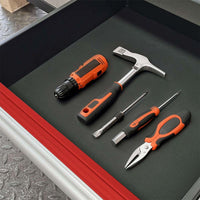 Tool Drawer With A Dark Liner Displays A Hammer Screwdrivers Pliers And A Compact Driver