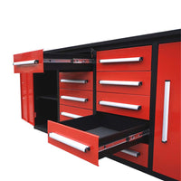 Tool Workbench With An Open Side Cabinet Door And Multiple Drawers