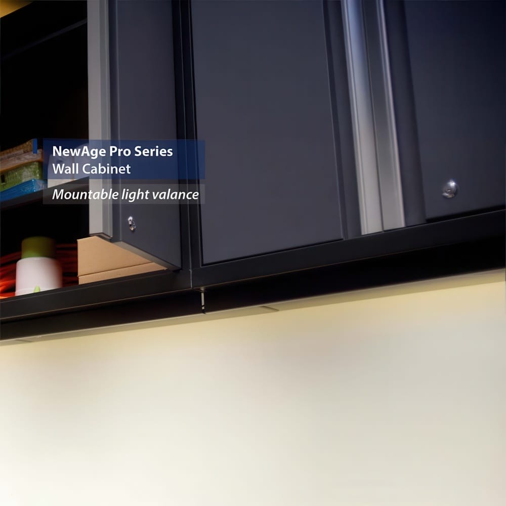 Under Cabinet View Of NewAge Pro Series Wall Cabinets Showing Mountable Light Valance And Stored Items On The Lower Shelf