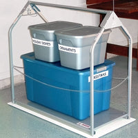Versa Lift Attic Lift Lowered to Garage Floor With Stacked Totes