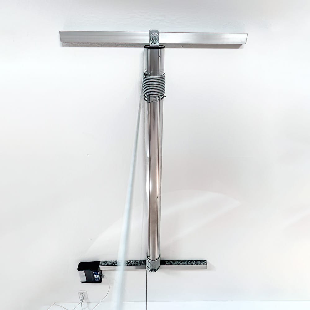 Vertical Metallic Pole Of AuxxLift Electric Hoist Garage Lift With A Sophisticated Design Extending From A Secure Base On The Floor To A Fixture Attached To A Horizontal Rail On The Ceiling