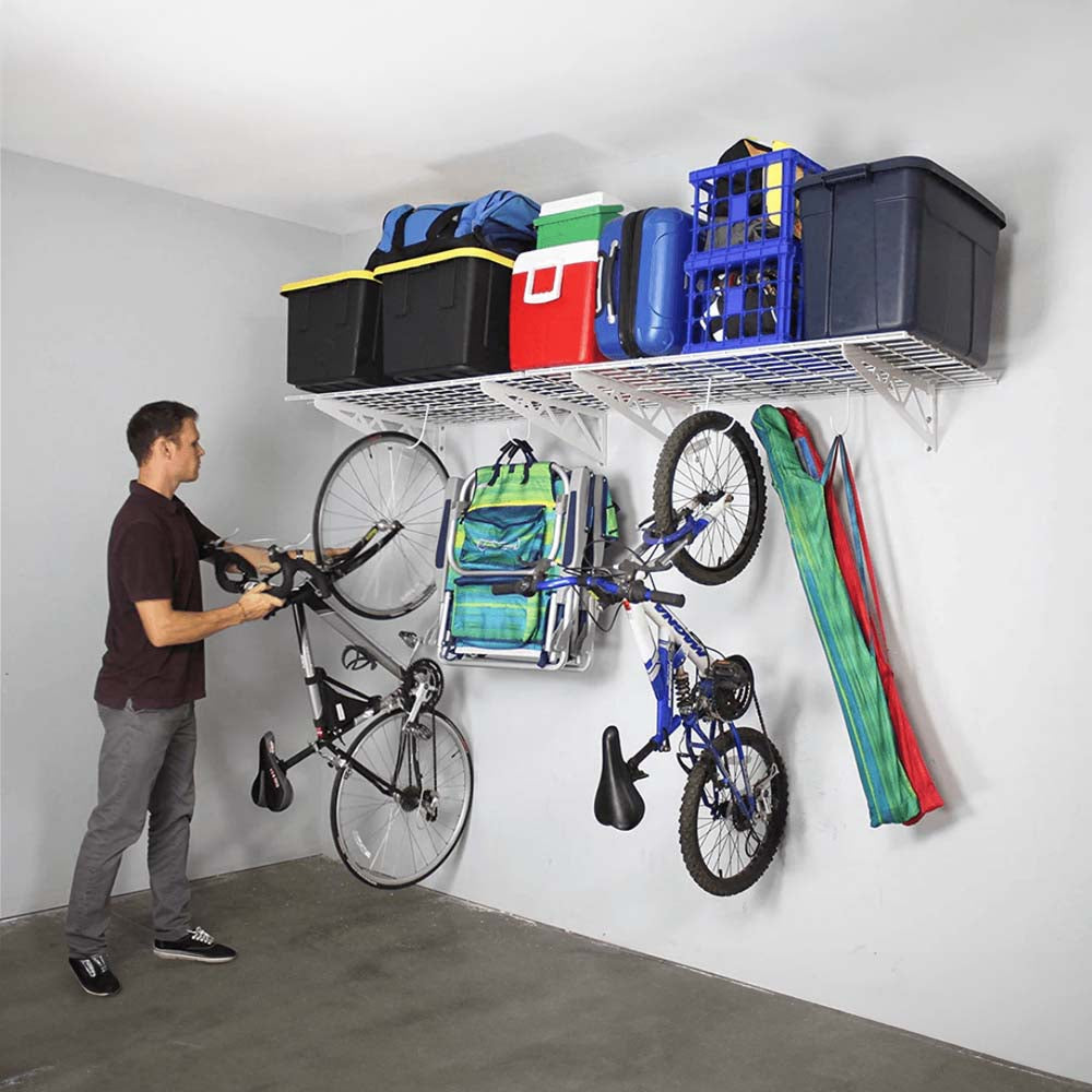 Wall-Mounted Storage Shelves With Bicycles Chairs And Various Containers Neatly Stored On Shelves And Hooks