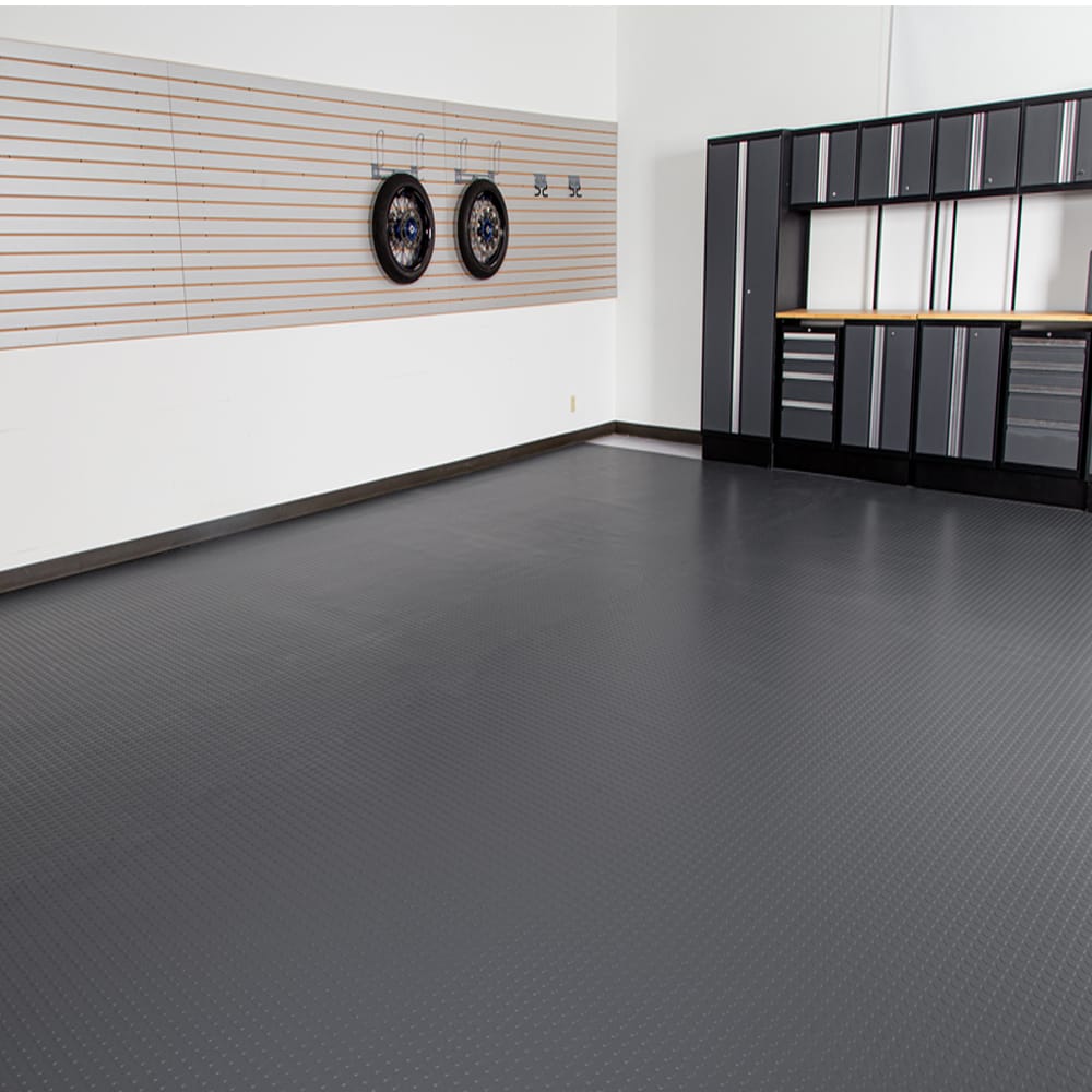 Well Organized Garage Featuring A Sleek Black Modular Storage System And A Dark G-Floor Coin Flooring
