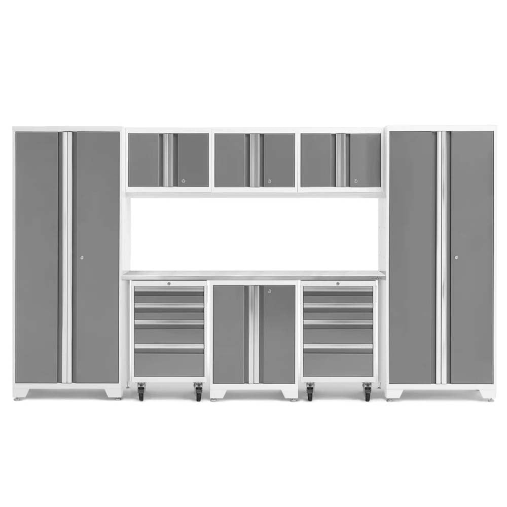 White And Gray Modular Garage Storage System With Tall Cabinets Upper Wall Units Mobile Drawer Chests And A Central Work Surface