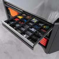Wide Drawer With Divided Compartments Holding Assorted Screws Wall Plugs And Hardware