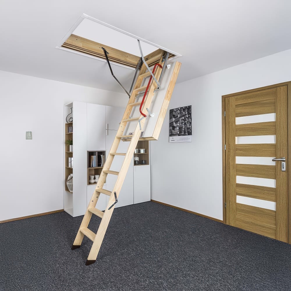 Wood Attic Ladder Extended From A Ceiling Hatch Surrounded By White Walls