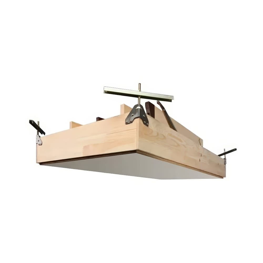 Wooden Attic Ladder Frame With A Closed Insulated Hatch Door And Visible Mounting Hardware For Ceiling Installation