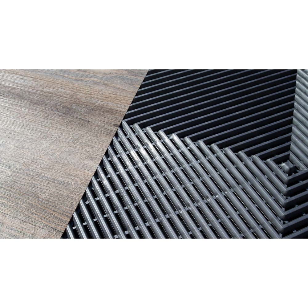 Wooden Surface Partially Covered By A Geometric Abstract Pattern Of Intersecting Black Race Deck Tiles