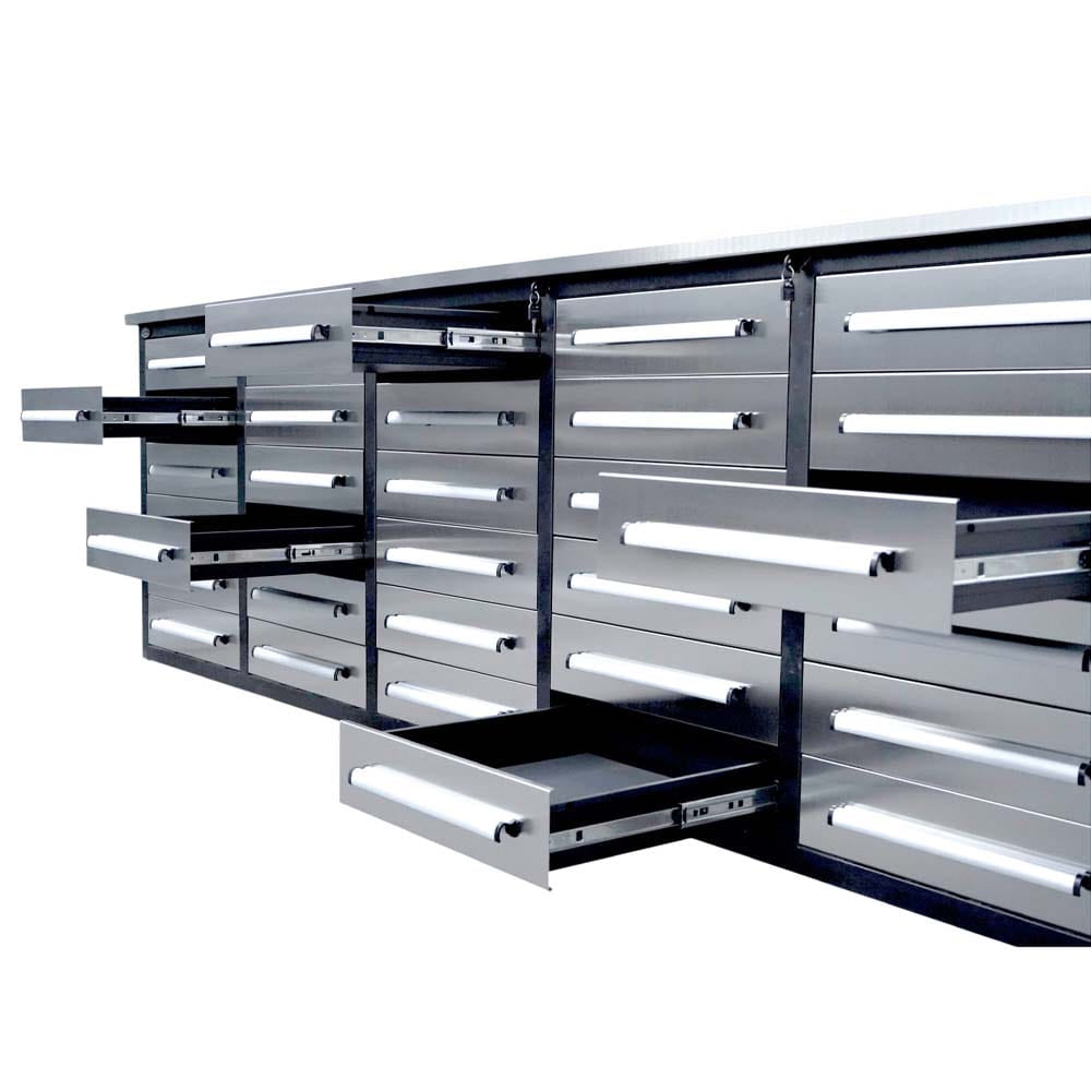 Workbench Cabinet With Many Silver Drawers Is Shown With Several Drawers Sliding Open