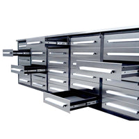 Workbench Cabinet With Many Silver Drawers Is Shown With Several Drawers Sliding Open