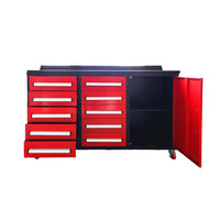 Workbench With Multiple Drawers Pulled Open And A Side Cabinet Door Open